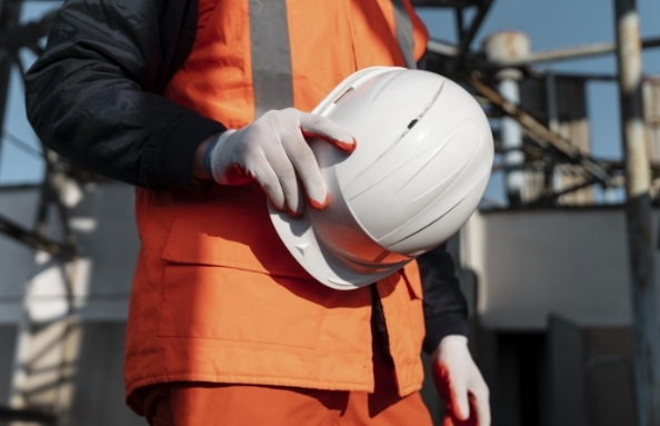 man holding a hardhat