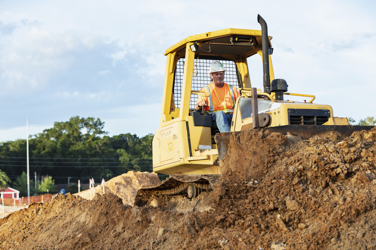 Man driving bulldozer