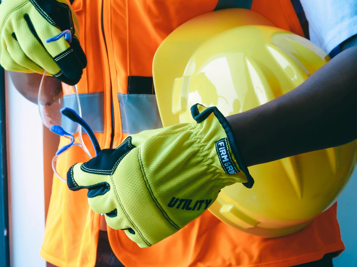 Gloves, glasses, hardhat, and safety vest
